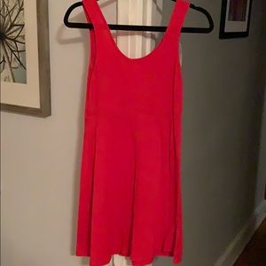 Red colored, light dress.